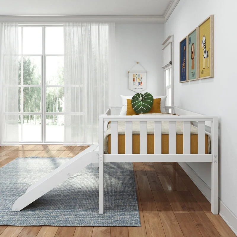 Max And Lily Soren Twin Ultra Low Loft Bed With Slide White Room Scene 7 Max and Lily Soren Twin Ultra Low Loft Bed With Slide in White - low loft bed in a sunlit bedroom viewed from the end, with the slide to one side and a slatted end panel.