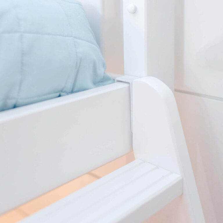 Max And Lily Twin High Loft Bed White Guardrail Detail 6 Max and Lily Twin High Loft Bed in white - close-up of the corner guardrail joint and color-matched hardware