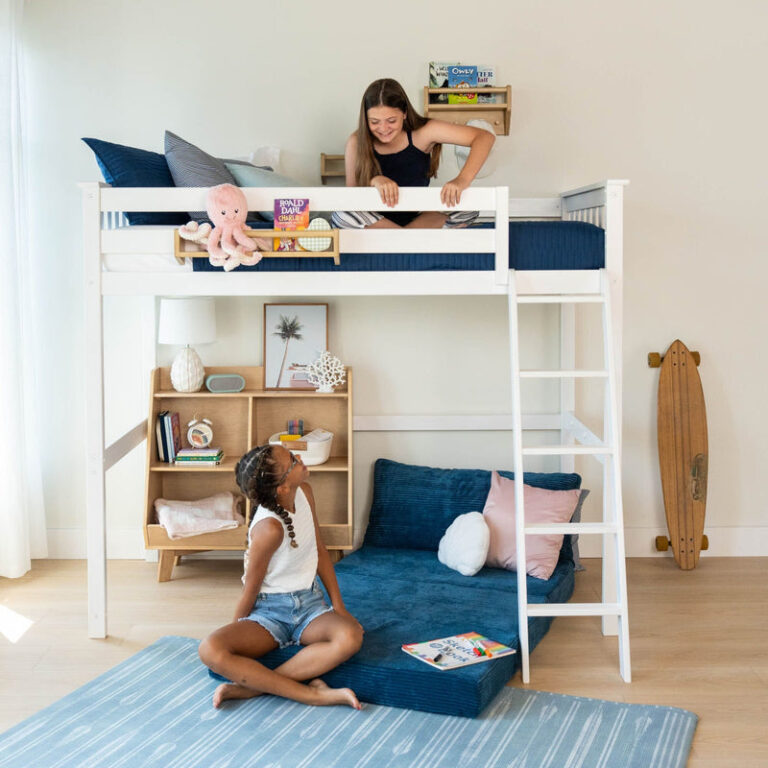 Max And Lily Twin High Loft Bed White Kids Playing Max and Lily Twin High Loft Bed in White - two children on and beside the loft bed in a bright bedroom with a bookshelf and floor cushions.