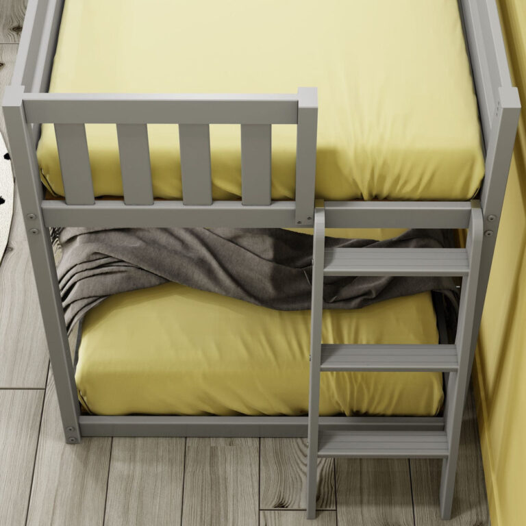 Max And Lily Twin Low Bunk Bed With Ladder On End Grey Ladder Detail 5 Max And Lily Twin Low Bunk Bed with Ladder on End in Grey - overhead close-up of the end ladder steps and slatted guardrail between the upper and lower bunks.
