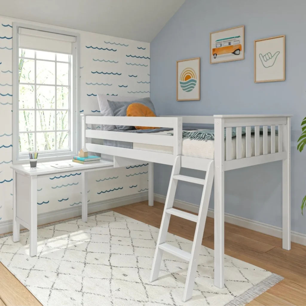 Max and Lily Twin Low Loft Bed In White With Desk in White - angled room scene showing the low loft bed with safety guardrails, angled ladder, and attached corner desk underneath in a kids' bedroom.
