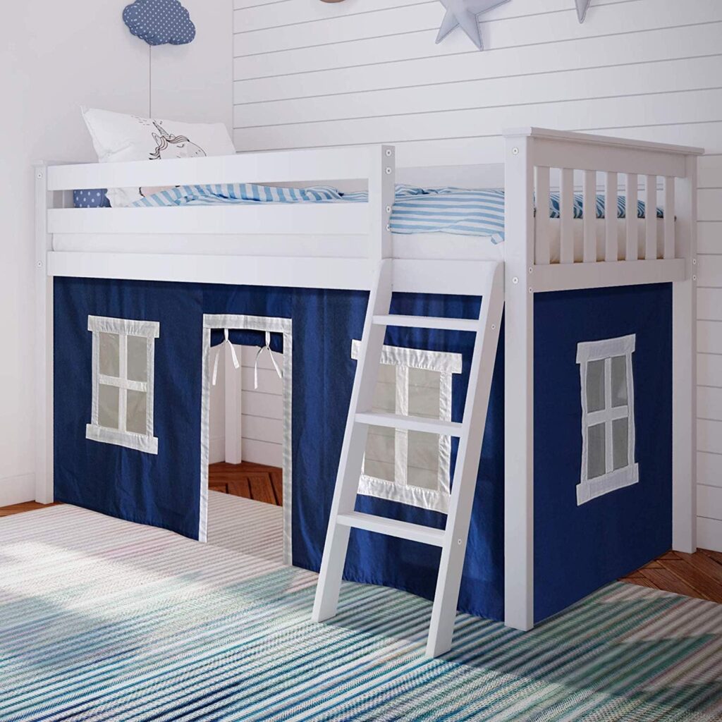 Max and Lily Twin Low Loft Bed in Blue/White - styled room scene showing the white frame with blue play tent, windows, curtained door, and angled ladder.