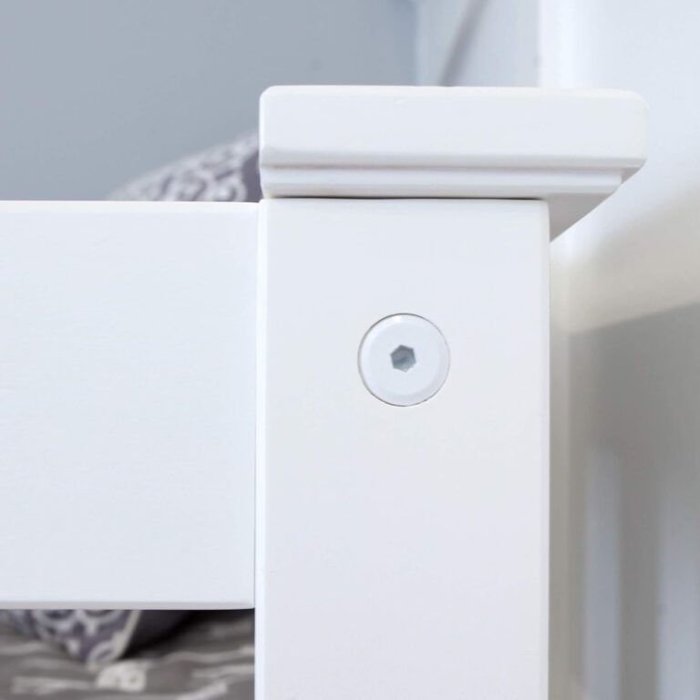 Max And Lily Twin Low Loft Bed With Ladder And Curtains Hardware Detail Max and Lily Twin Low Loft Bed - close-up of a countersunk, color-matched screw on the white bed post.