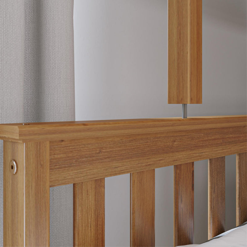 Max and Lily Twin Over Full Bunk Bed in Pecan - close-up of the slatted headboard top rail and the metal pin connection joining the upper bunk post.