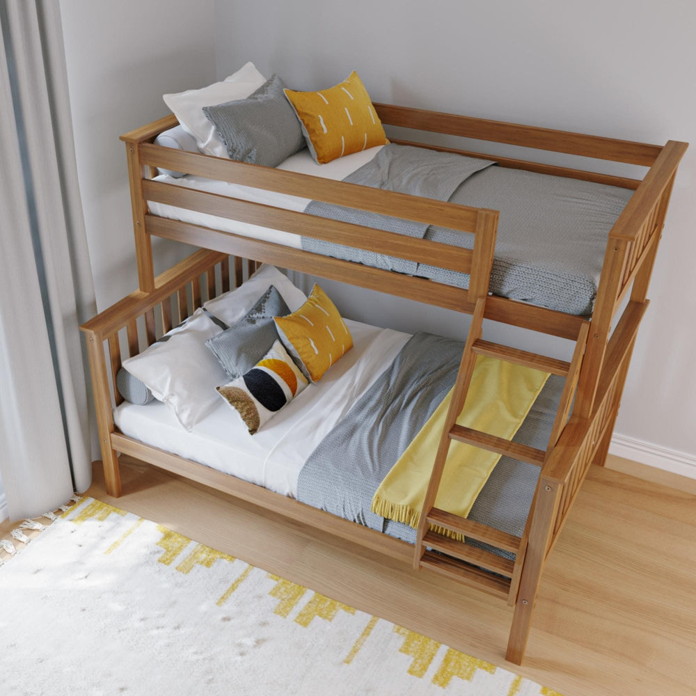 Max and Lily Twin Over Full Bunk Bed in Pecan - high-angle view of the twin top bunk and full lower bed made up with pillows and blankets, with the ladder hooked on the side