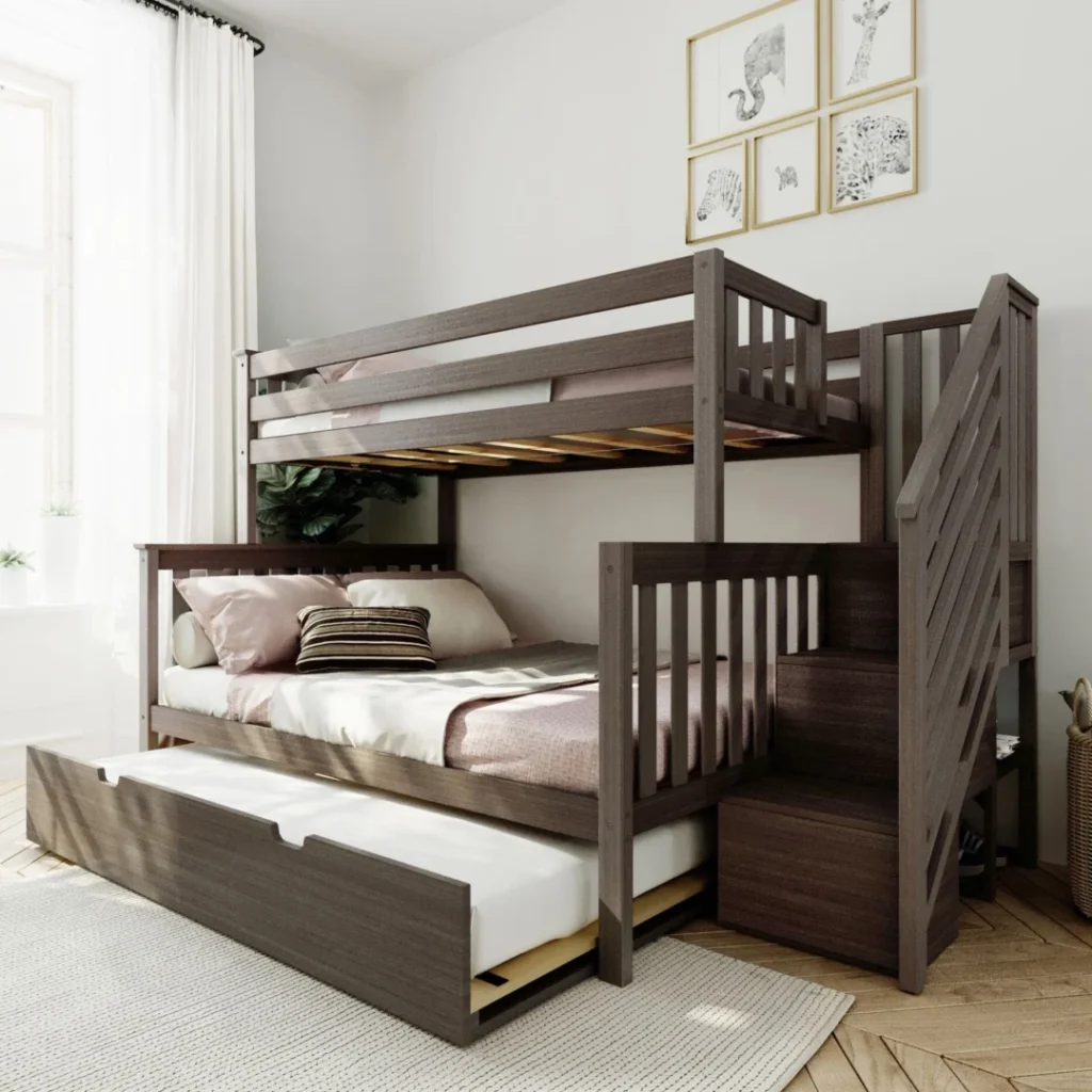Max and Lily Twin Over Full Bunk Bed with Stairs and Trundle in Clay - staged in a bedroom with the trundle bed pulled out and staircase with safety railing at the side