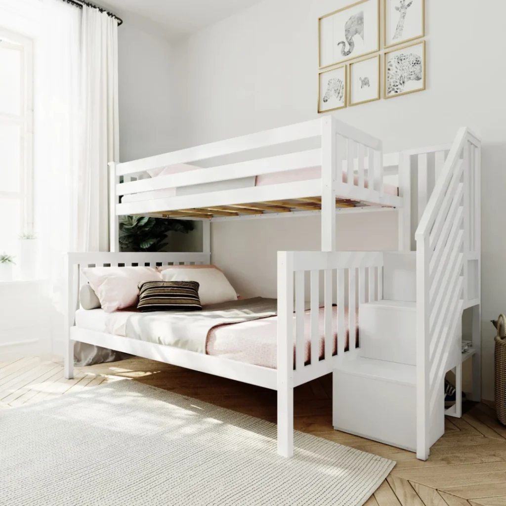 Max and Lily Twin Over Full Bunk Bed with Stairs in White - angled view in a sunlit kids bedroom showing the storage staircase, safety guardrails and pink bedding