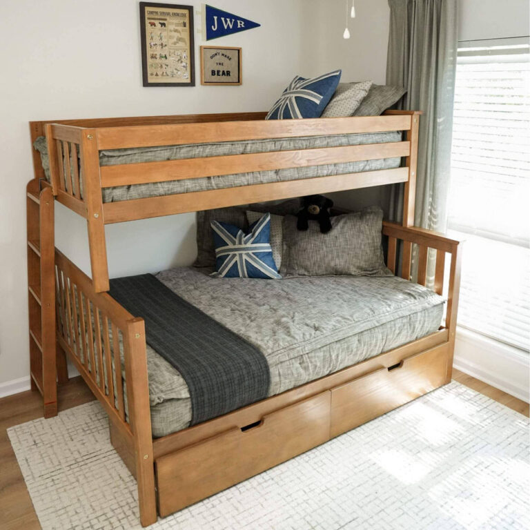 Max And Lily Twin Over Full Bunk Bed With Storage Pecan Room Scene Max and Lily Twin Over Full Bunk Bed with Storage in Pecan - front view in a bedroom showing the twin top bunk with guardrails above the full lower bunk and storage drawers