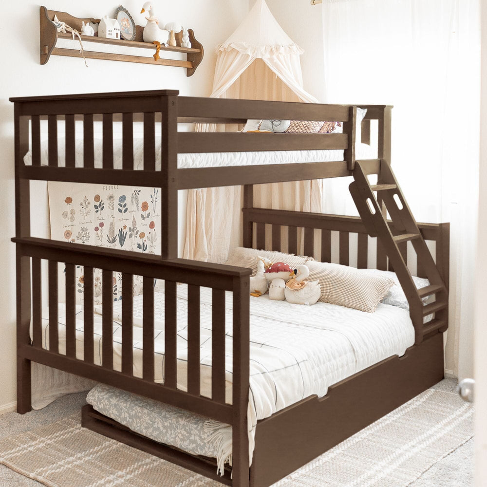 Max and Lily Twin Over Full Bunk Bed with Trundle in Walnut - angled view in a kids bedroom with canopy decor, safety guardrails on both bunks, angled ladder, and the trundle peeking out below the full bed