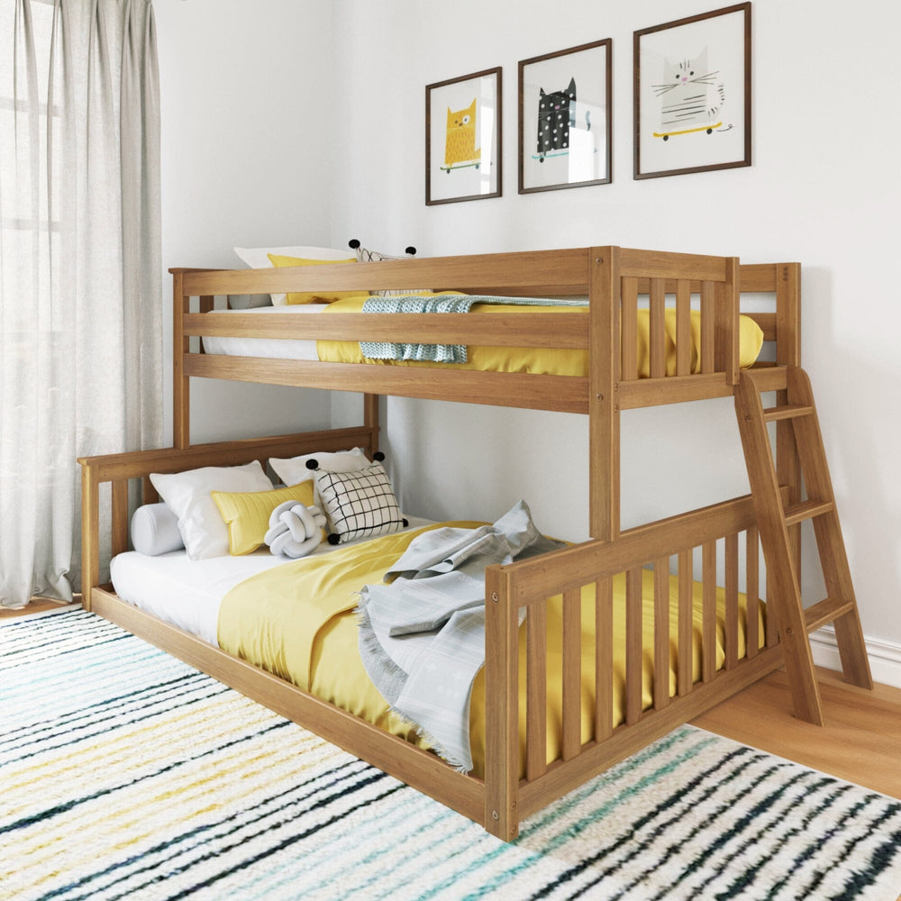 Max and Lily Twin Over Full Low Bunk Bed in Pecan - angled view styled in a kids' bedroom with yellow bedding, framed cat art, and an end ladder