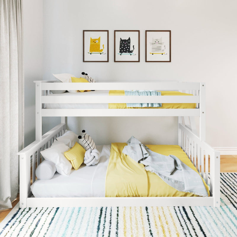 Max and Lily Twin Over Full Low Bunk Bed in White - front view in a kids bedroom with framed cat prints, showing both bunks made up with white and yellow bedding.