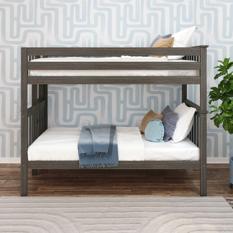 Max and Lily Twin Over Twin Bunk Bed with Ladder on End in Clay - front view showing both twin bunks made up with pillows and bedding against patterned wallpaper.