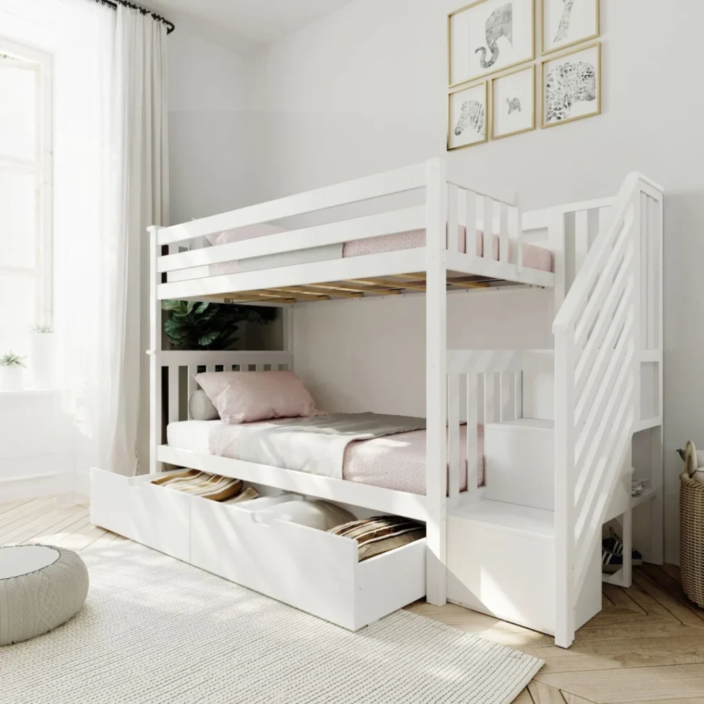 Max and Lily Twin Over Twin Bunk Bed With Stairs & Storage Drawers in White - bright bedroom scene showing the staircase with handrail, full-length safety guardrails, and two under-bed storage drawers pulled open with blankets inside