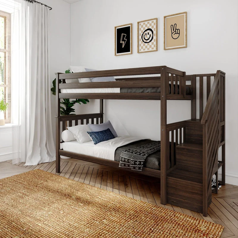 Max and Lily Twin Over Twin Bunk Bed with Stairs in Walnut - angled room scene showing the staircase with safety handrail, full-length guardrails and styled bedding beside a sunlit window
