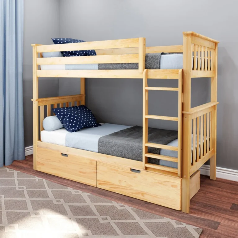 Max and Lily Twin Over Twin Bunk Bed With Storage in Natural - bunk bed with safety guardrails, side ladder and two under-bed storage drawers in a kids bedroom with grey walls and patterned rug