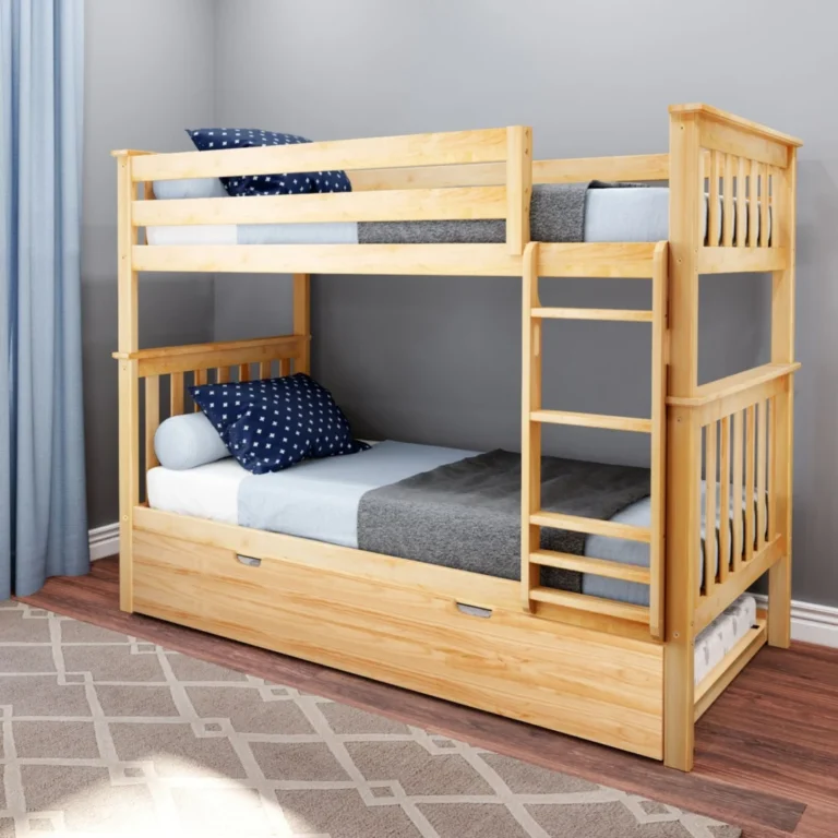 Max And Lily Twin Over Twin Bunk Bed With Trundle Natural Room Scene Max and Lily Twin Over Twin Bunk Bed With Trundle in Natural - bunk bed with safety guardrails, angled ladder and closed trundle drawer styled in a kids bedroom with blue bedding