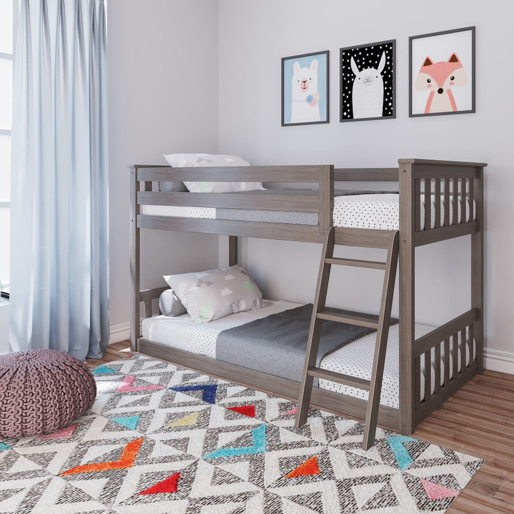 Max And Lily Twin over Twin Low Bunk Bed in clay - low bunk bed with full-length safety guardrails and angled ladder styled in a kids' bedroom with a geometric rug and animal wall art