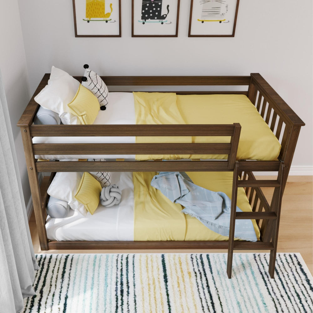 Max And Lily Twin over Twin Low Bunk Bed in Walnut - overhead view of both twin bunks made up with yellow bedding and guardrails in a kids room