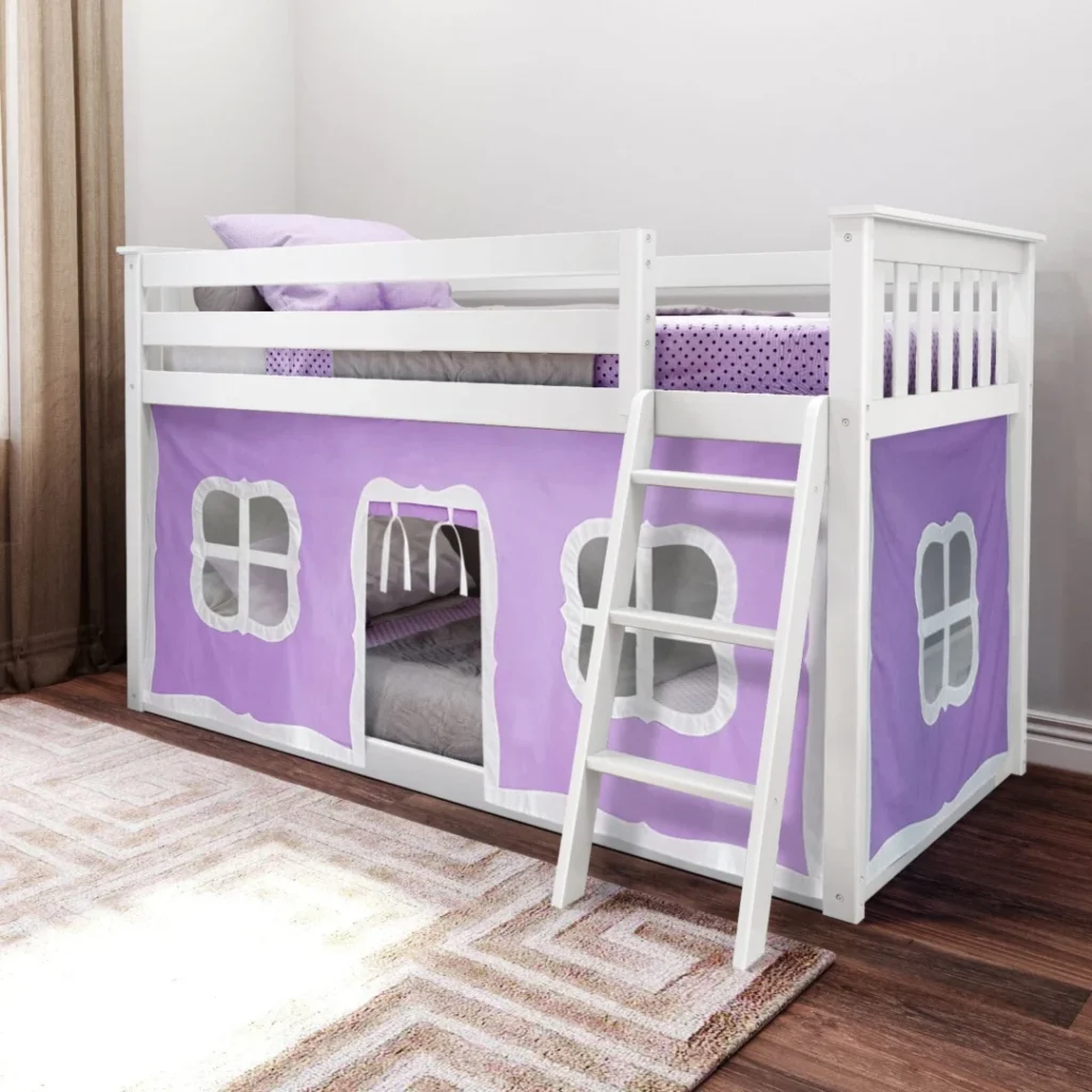 Max and Lily Twin Over Twin Low Bunk Bed With Curtain in Purple/White - white low bunk bed with purple playhouse curtain, angled ladder and safety guardrails in a kids bedroom.