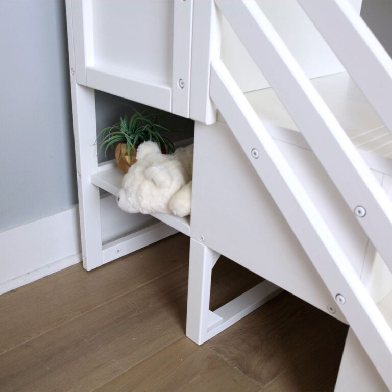Max And Lily Twin Over Twin Low Bunk Bed With Staircase Curtain White Blue White Under Stair Storage Max and Lily Twin Over Twin Low Bunk Bed With Staircase & Curtain in White Blue/White - close-up of the built-in staircase storage shelf holding a plush toy and a plant
