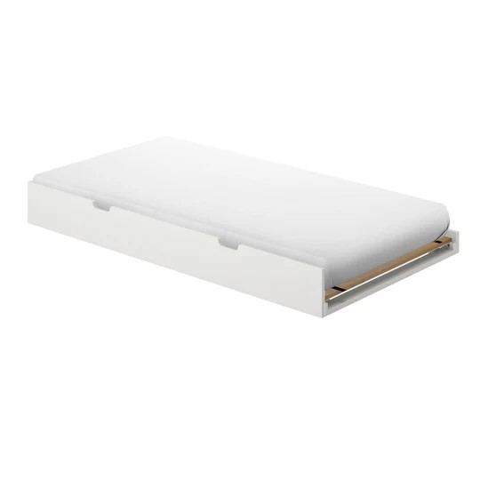 Max And Lily Twin Size Trundle Bed in White - angled view of the low trundle frame with a mattress on top, showing recessed hand grips and exposed wood slat ends