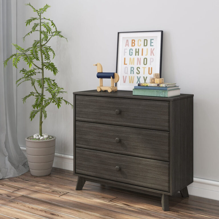 Max Lily Classic 3 Drawer Dresser Clay Room Scene 1 Max & Lily Classic 3 Drawer Dresser in Clay - angled in a styled kids room with a potted plant, framed alphabet print and wooden dog toy displayed on top.
