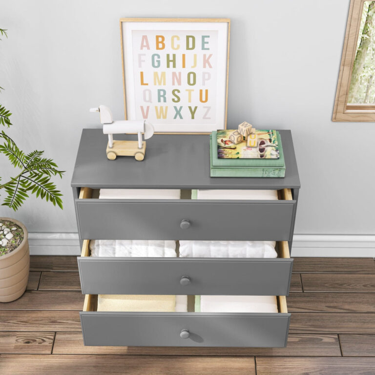 Max Lily Classic 3 Drawer Dresser Grey Drawers Open Max & Lily Classic 3 Drawer Dresser in grey - all three drawers pulled open in a room setting to show storage filled with folded clothing and linens.