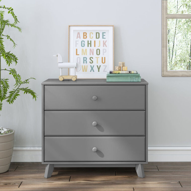 Max Lily Classic 3 Drawer Dresser Grey Room Scene 2 Max & Lily Classic 3 Drawer Dresser in grey - shown front-on in a nursery with an alphabet art print, wooden toy, and books resting on the top surface.