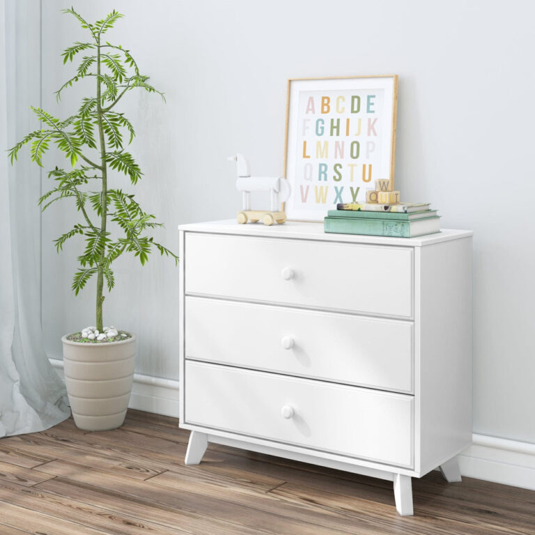 Max Lily Classic 3 Drawer Dresser White Room Scene 1 Max & Lily Classic 3 Drawer Dresser in White - angled room scene styled with a potted plant, alphabet print, and toy horse.