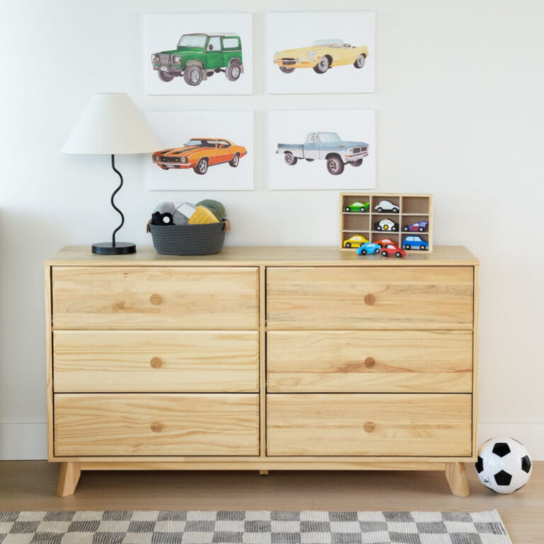 Max Lily Classic 6 Drawer Dresser Natural Front View Room Scene Max & Lily Classic 6 Drawer Dresser in Natural - front view in a child's room with a lamp, toy cars, and framed car prints on the wall.
