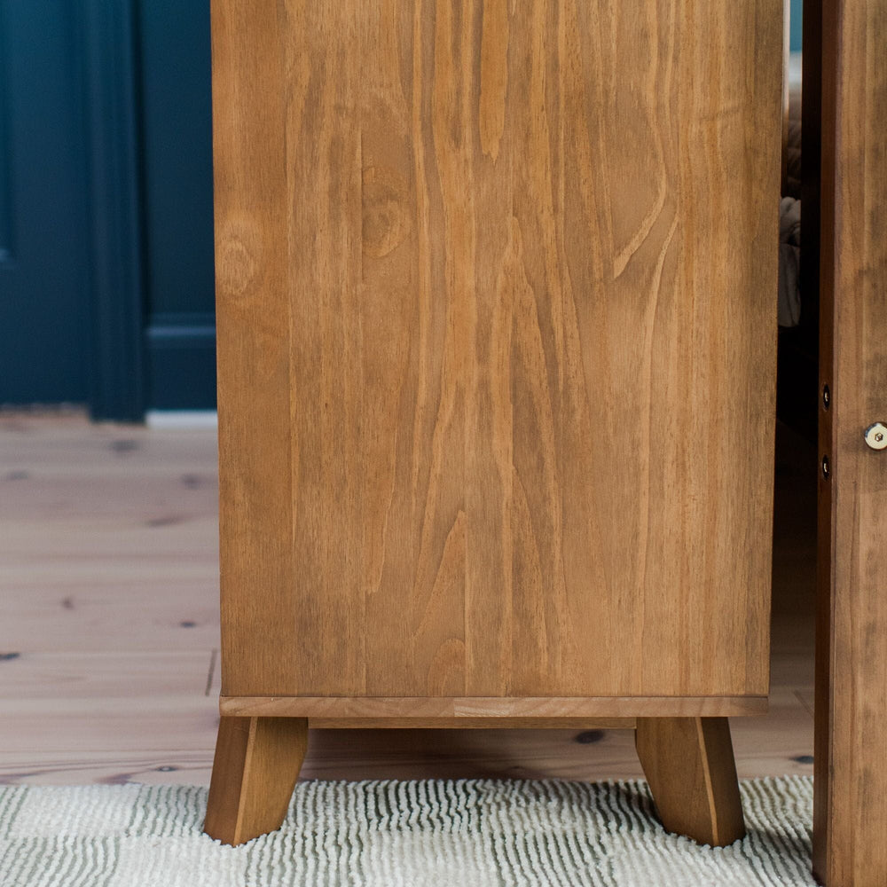 Max Lily Classic 6 Drawer Dresser Pecan Side Panel Detail Max & Lily Classic 6 Drawer Dresser in Pecan - close-up of the side panel wood grain and an angled tapered leg.