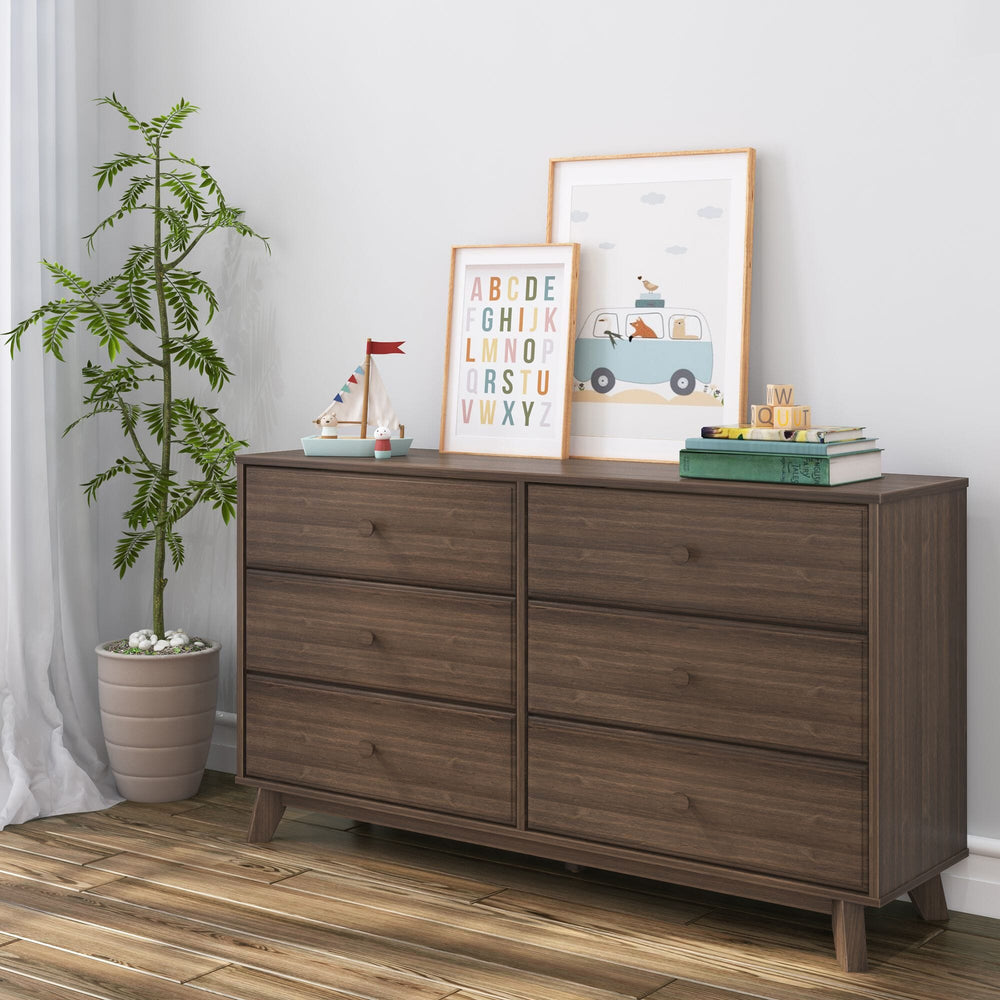 Max Lily Classic 6 Drawer Dresser Walnut Room Scene 1 Max & Lily Classic 6 Drawer Dresser in Walnut - styled in a kids room with a potted plant, framed alphabet and van prints, and toys on top.