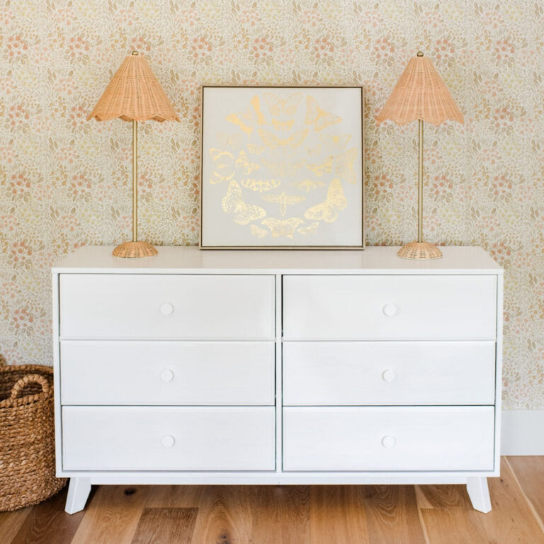 Max Lily Classic 6 Drawer Dresser White Front View Max & Lily Classic 6 Drawer Dresser in White - front view in a styled room with rattan lamps and butterfly art displayed above.
