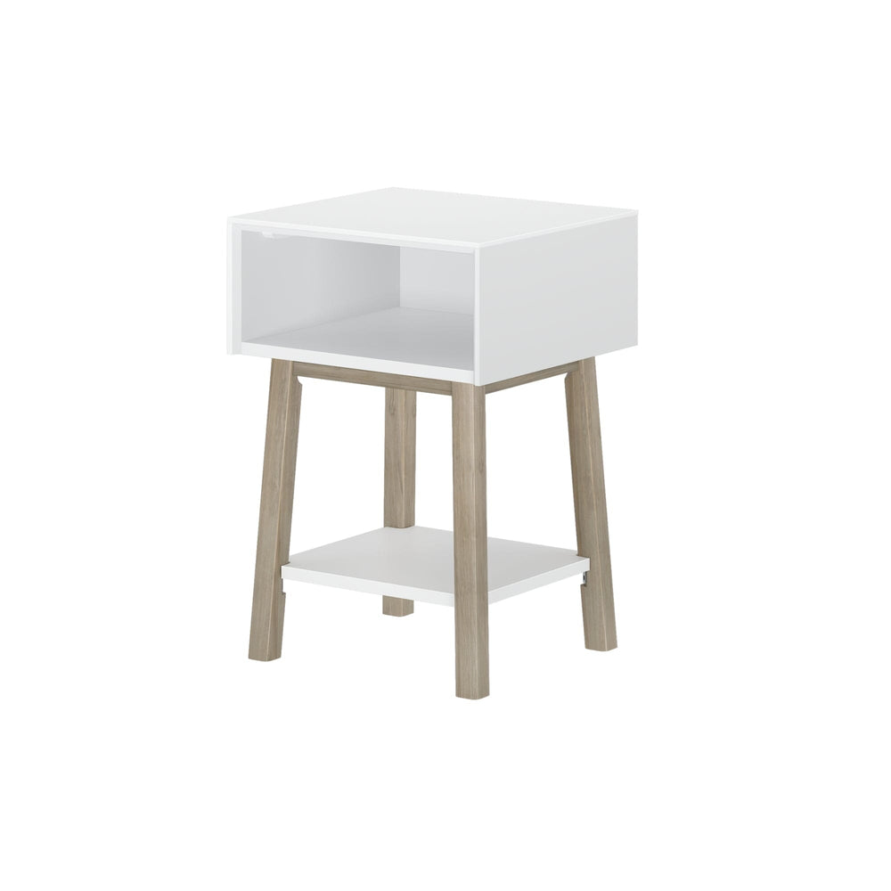 Max & Lily Mid-Century Modern Cubby Night Stand in White/Blonde - angled studio view on a plain background revealing the open cubby and lower storage shelf on tapered wood legs.