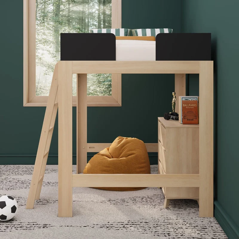 Max & Lily Mid-Century Modern Full High Loft Bed in Blonde/Black - close-up of the open area under the loft with a dresser holding books and decor and a bean bag chair beside a window.