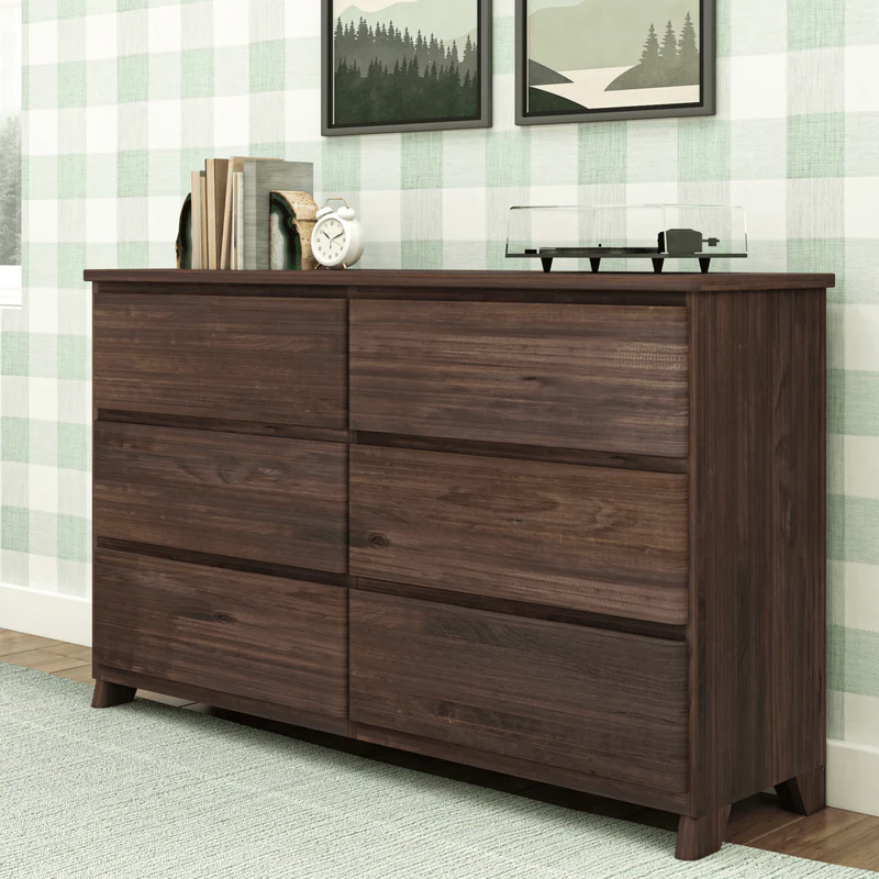 Max & Lily Modern Farmhouse 6 Drawer Dresser in Barnwood Brown - angled view in a buffalo-check bedroom setting with books and a record player on top.