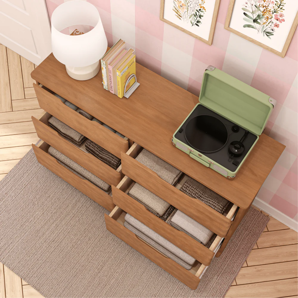 Max & Lily Modern Farmhouse 6 Drawer Dresser in Pecan - overhead view with all six drawers open revealing folded clothes and storage baskets inside.