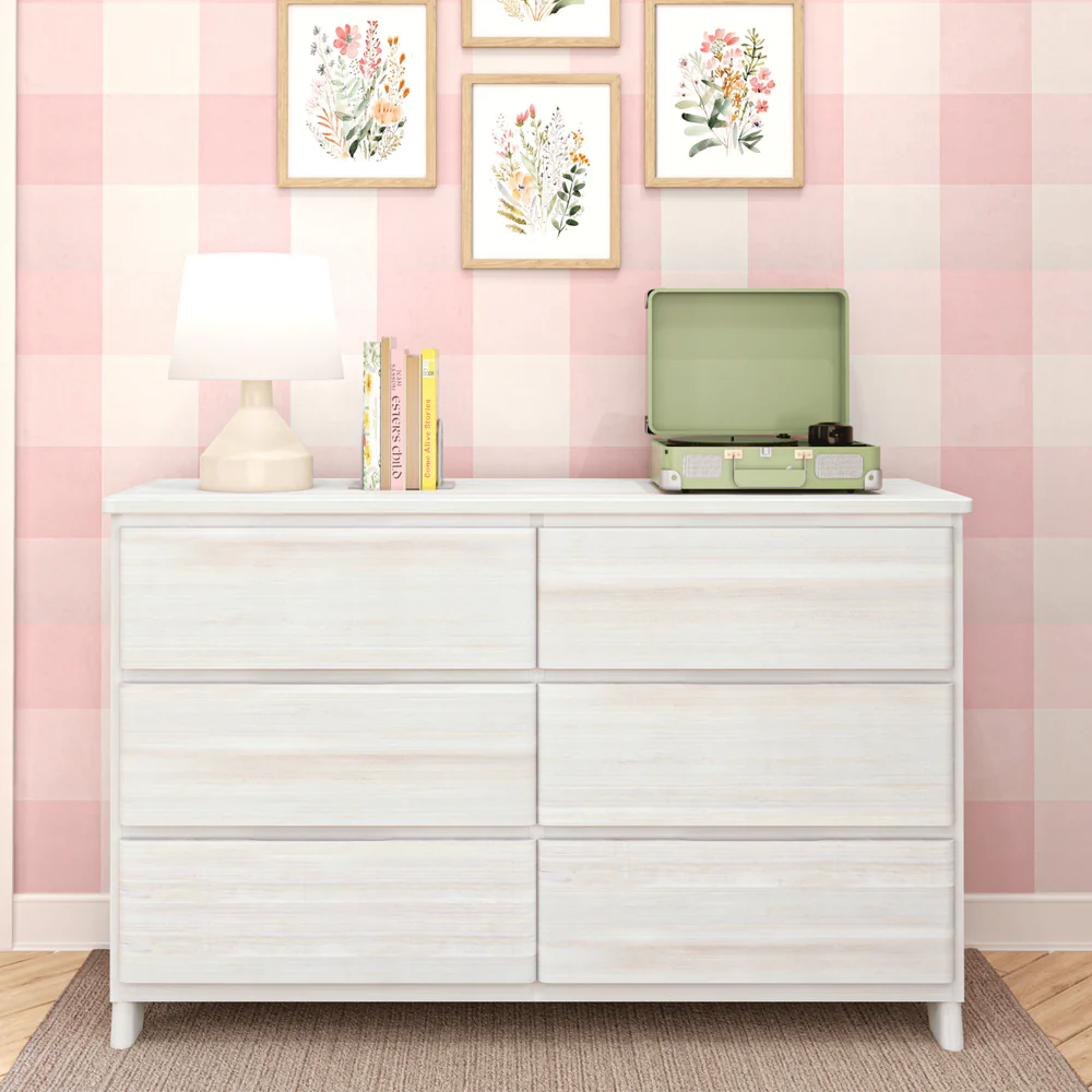 Max & Lily Modern Farmhouse 6 Drawer Dresser in White Wash - styled in a pink plaid nursery with a lamp, books, and record player on top