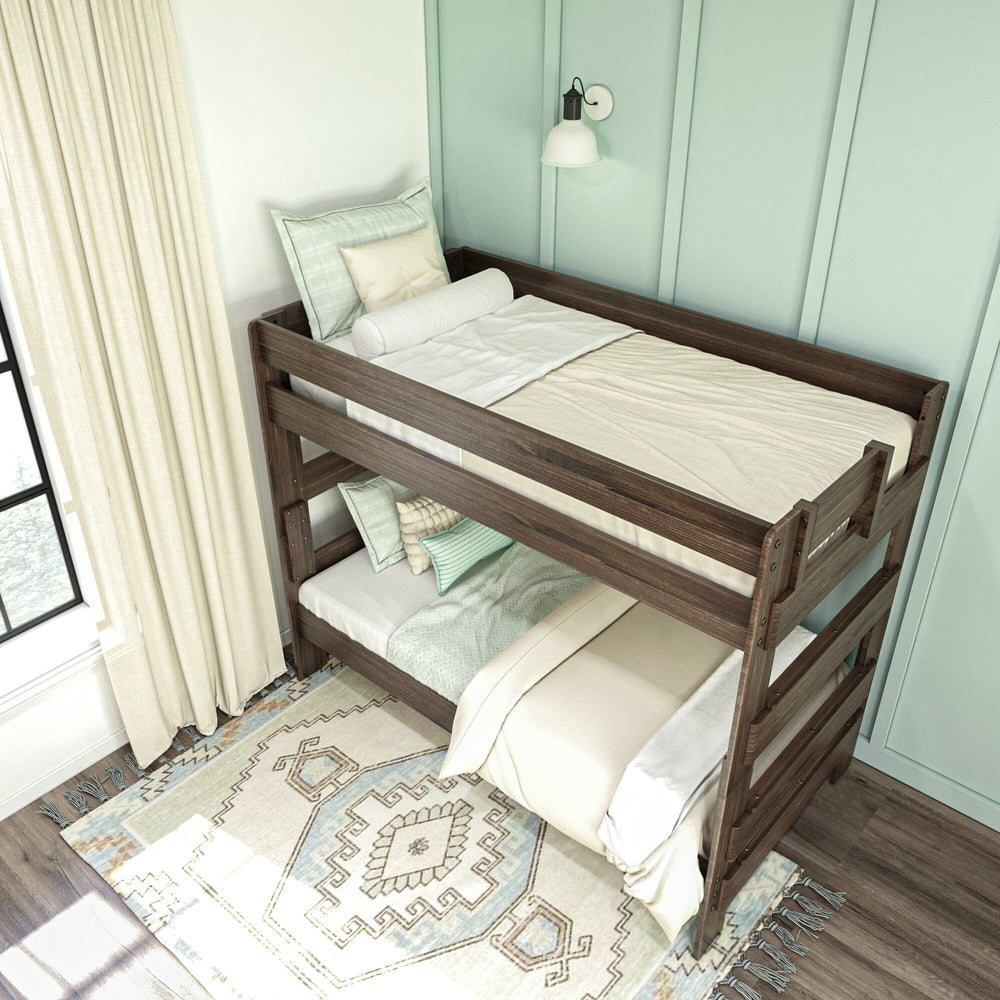 Max & Lily Modern Farmhouse Twin Over Twin Bunk Bed in Barnwood Brown - high overhead view of both bunks made up with bedding beside a window and rug.