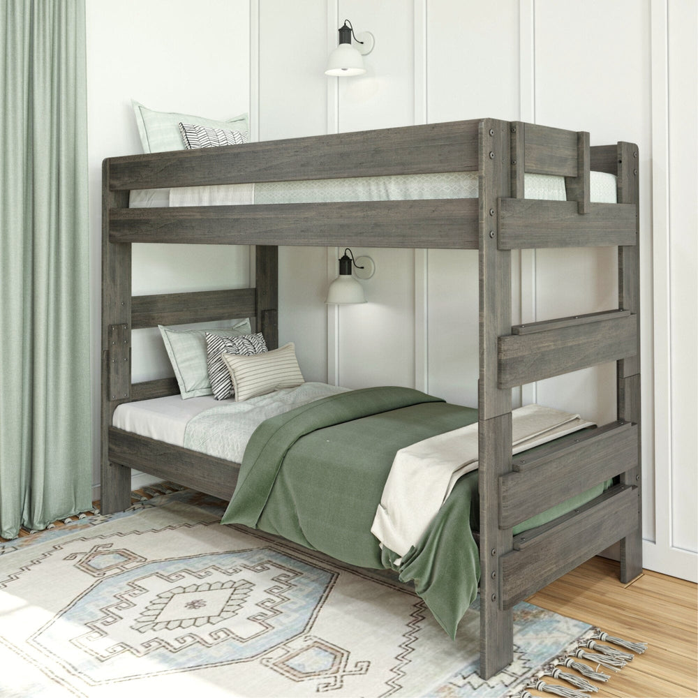 Max & Lily Modern Farmhouse Twin Over Twin Bunk Bed in Driftwood - front angled view of the full bunk bed styled in a farmhouse bedroom with green curtains and an area rug