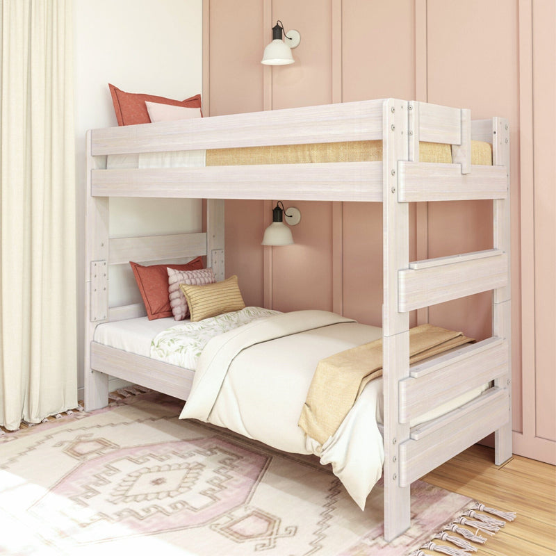Max & Lily Modern Farmhouse Twin Over Twin Bunk Bed in White Wash - styled in a pink bedroom with the full twin over twin bunk shown at an angle.