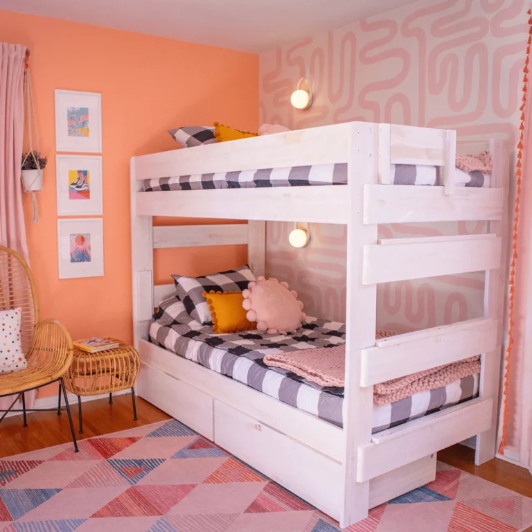 Max Lily Modern Farmhouse Twin Over Twin Bunk Bed With Storage Drawers White Wash Room Scene 7 Max & Lily Modern Farmhouse Twin Over Twin Bunk Bed With Storage Drawers in White Wash - styled bedroom scene with buffalo-check bedding and a rattan chair.