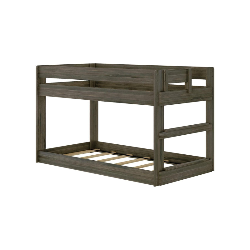 Max & Lily Modern Farmhouse Twin Over Twin Low Bunk Bed in Barnwood Brown - angled product view on a white background showing the guardrails, end ladder and slatted mattress support.