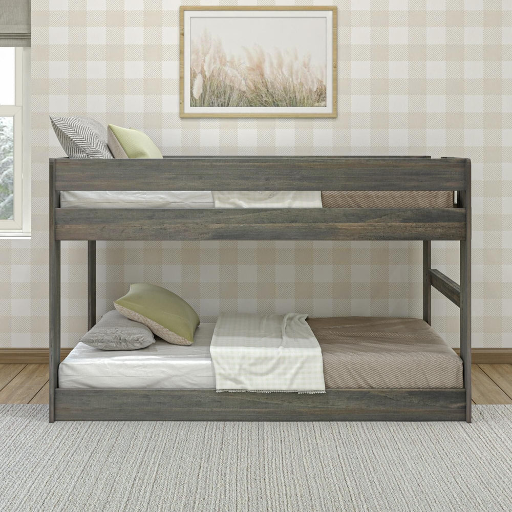 Max & Lily Modern Farmhouse Twin Over Twin Low Bunk Bed in Driftwood - front view showing both twin bunks made up with bedding in a styled bedroom.