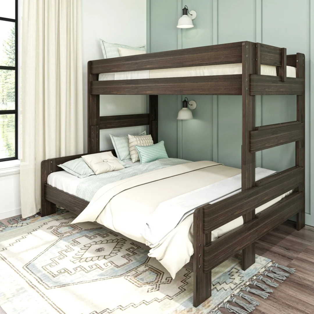 Max & Lily Modern Farmhouse Twin XL-Over-Queen Bunk Bed in Barnwood Brown - angled room view of the twin XL top bunk with full-length safety guardrails over the queen lower bed in a bedroom with a patterned rug