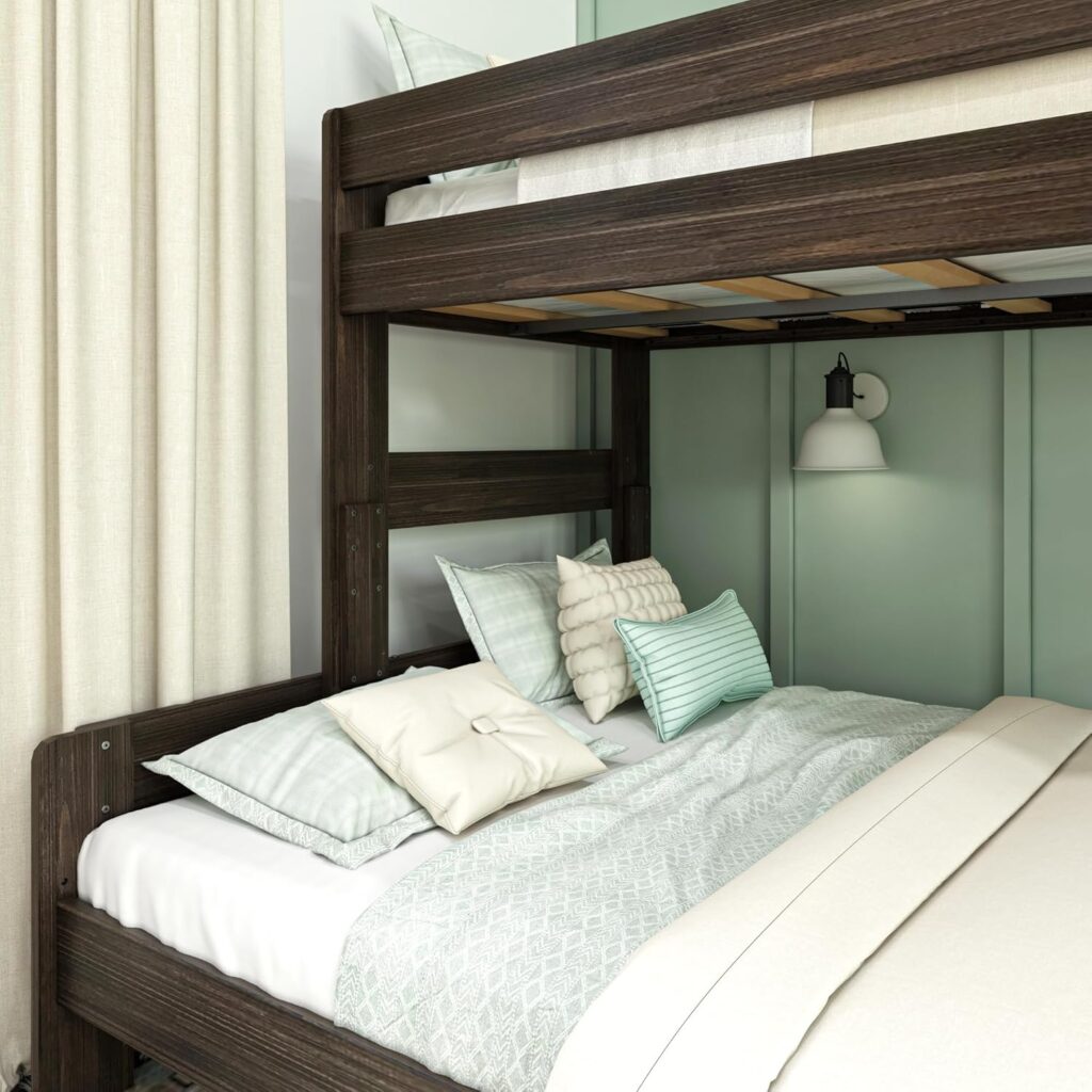 Max Lily Modern Farmhouse Twin Xl Over Queen Bunk Bed Lower Bunk Detail 5 Max & Lily Modern Farmhouse Twin XL-Over-Queen Bunk Bed - close-up of the lower bunk made up with bedding, showing the underside slats of the upper bunk and a wall sconce