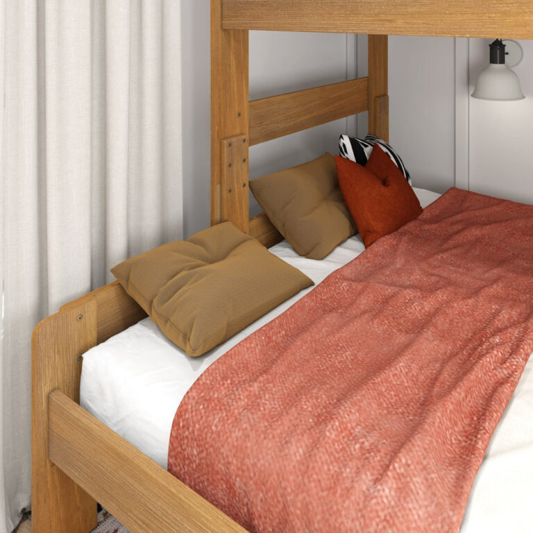 Max & Lily Modern Farmhouse Twin XL-Over-Queen Bunk Bed in Pecan - close-up of the lower queen bunk dressed with pillows and a rust throw blanket.