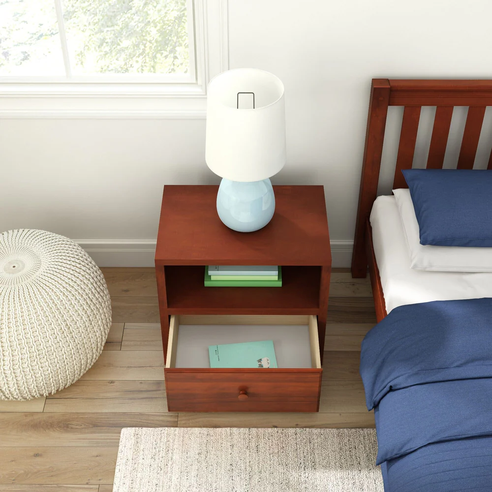 Maxtrix 1 Drawer Nightstand in Chestnut - overhead view beside a bed with the drawer open holding a book and a lamp on top