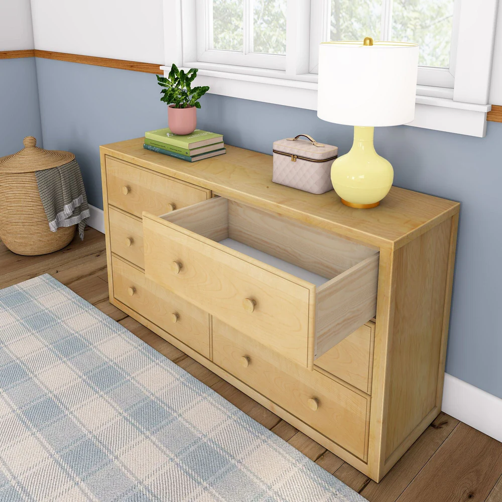 Maxtrix 6 Drawer Dresser in Natural - top drawer pulled open to show the deep storage space, in a styled bedroom