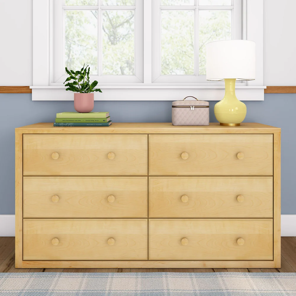 Maxtrix 6 Drawer Dresser in Natural - front view of all six drawers with round wood knobs in a bedroom setting